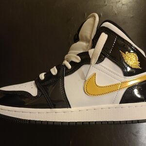 Air Jordan Black and Gold Sneakers